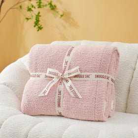 Snuggle Sac reversible design highlights two pink sides for versatile styling