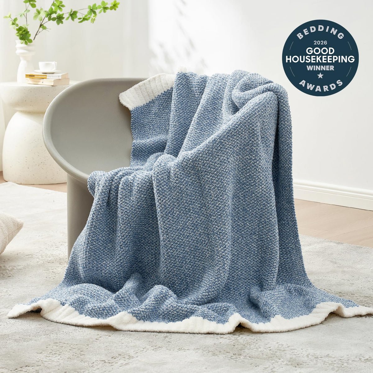 Snuggle Sac reversible knit blanket showing dual heather blue sides.