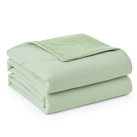 Snuggle Sac sage-green drape on bed shows airy silhouette