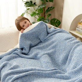 Snuggle Sac travel-friendly throw blanket ideal for picnics and camping.