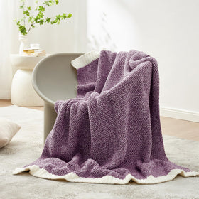 Travel-ready throw suitable for outdoor picnics and camping.