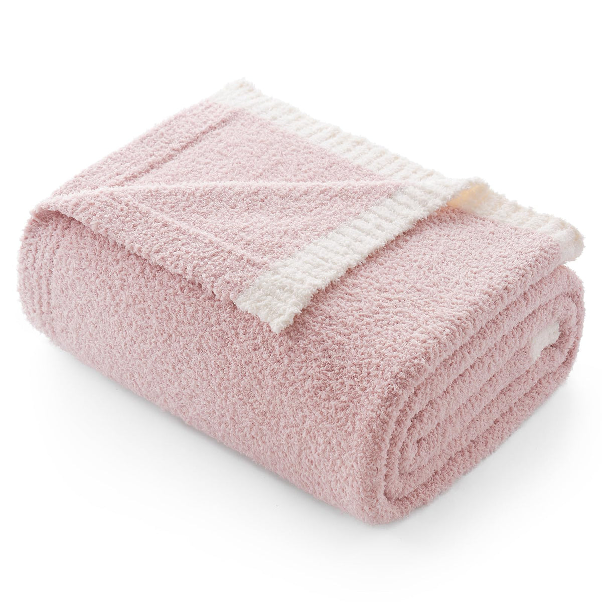 Snuggle Sac ultra soft throw blanket in pink on sofa for cozy warmth