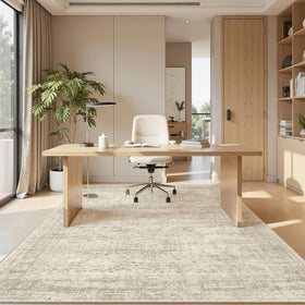 Soalmost 5x8 beige area rug in a living room setup with neutral décor.