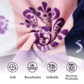 SOCHOW blanket draped on bed for relaxing evenings