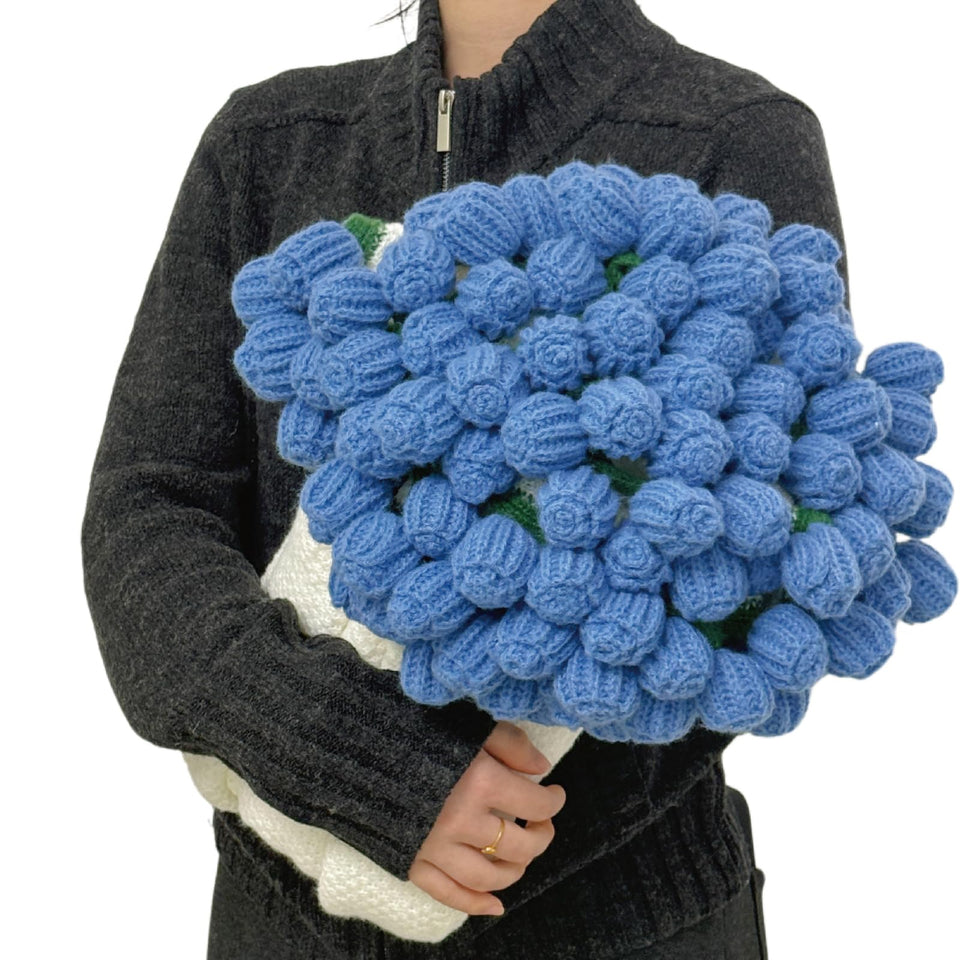 SoffMoiis blue rose bouquet blanket rolled into a decorative bouquet