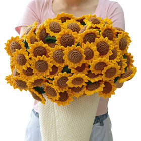 SoffMoiis crochet sunflower bouquet blanket rolled for easy display and warmth.