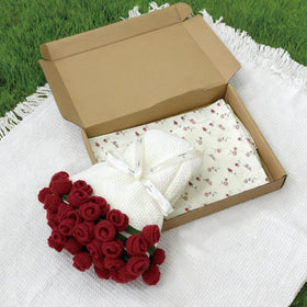 SoffMoiis round blanket shown as picnic mat for outdoor use.