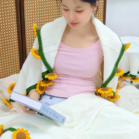 SoffMoiis round floral blanket doubles as cozy throw or bouquet display.