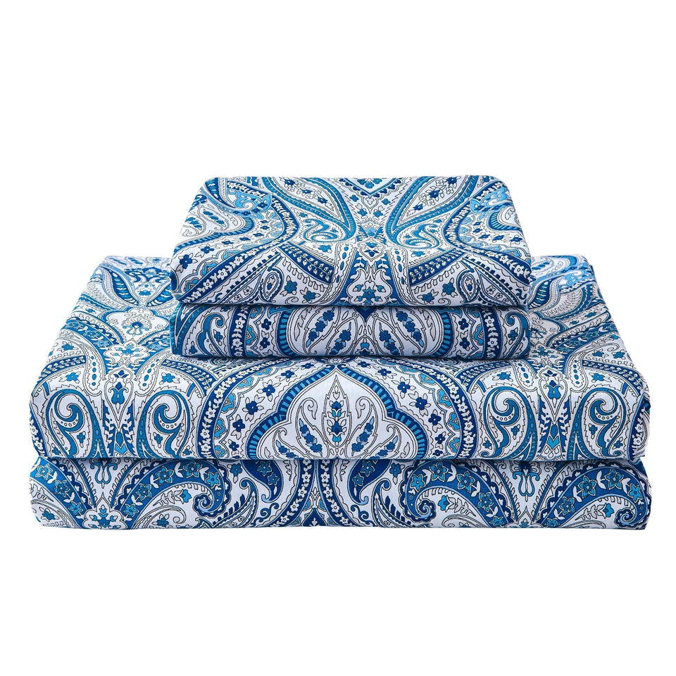 Softan blue paisley queen sheet set seen in a bed, highlighting the paisley design and microfiber softness
