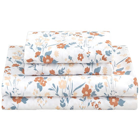 Softan Floral Queen sheet set with orange flowers laid flat for a bright bedroom setup