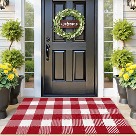 SofterCharm area rug in red and white plaid greets guests with cozy warmth