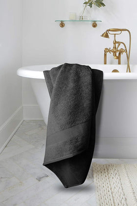 Softolle bath towels grey in a dorm room, cozy and reliable daily essential.