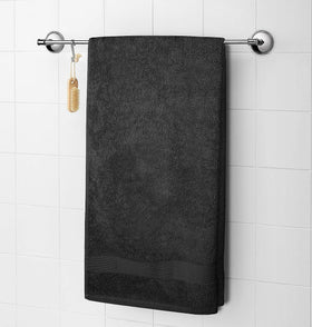 Softolle towels grey in a yoga studio setting, perfect for post-workout drying.