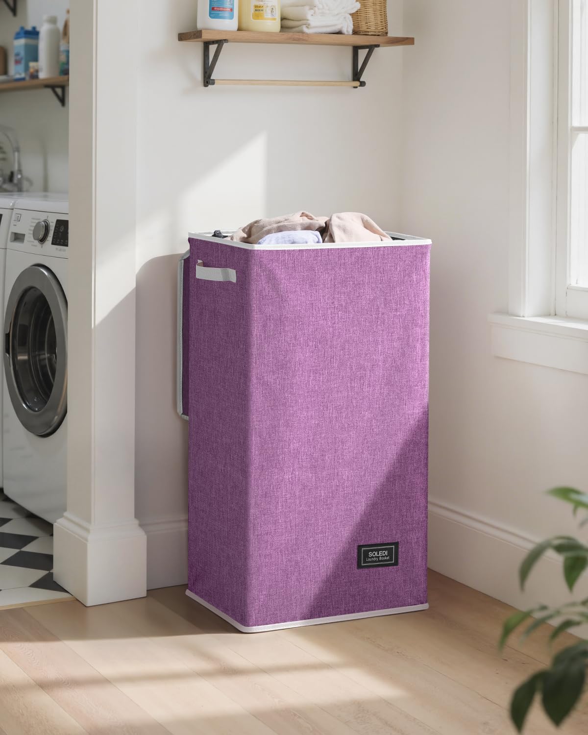 SOLEDI 100L capacity hamper shown full for a week's laundry.