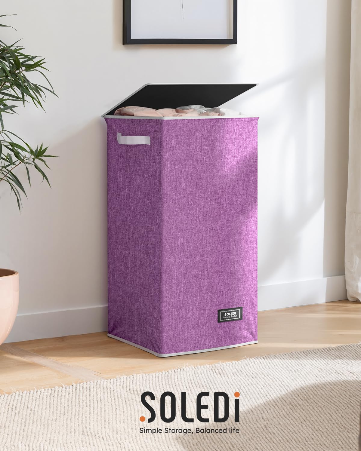 SOLEDI purple color adds a vibrant touch to the laundry area.