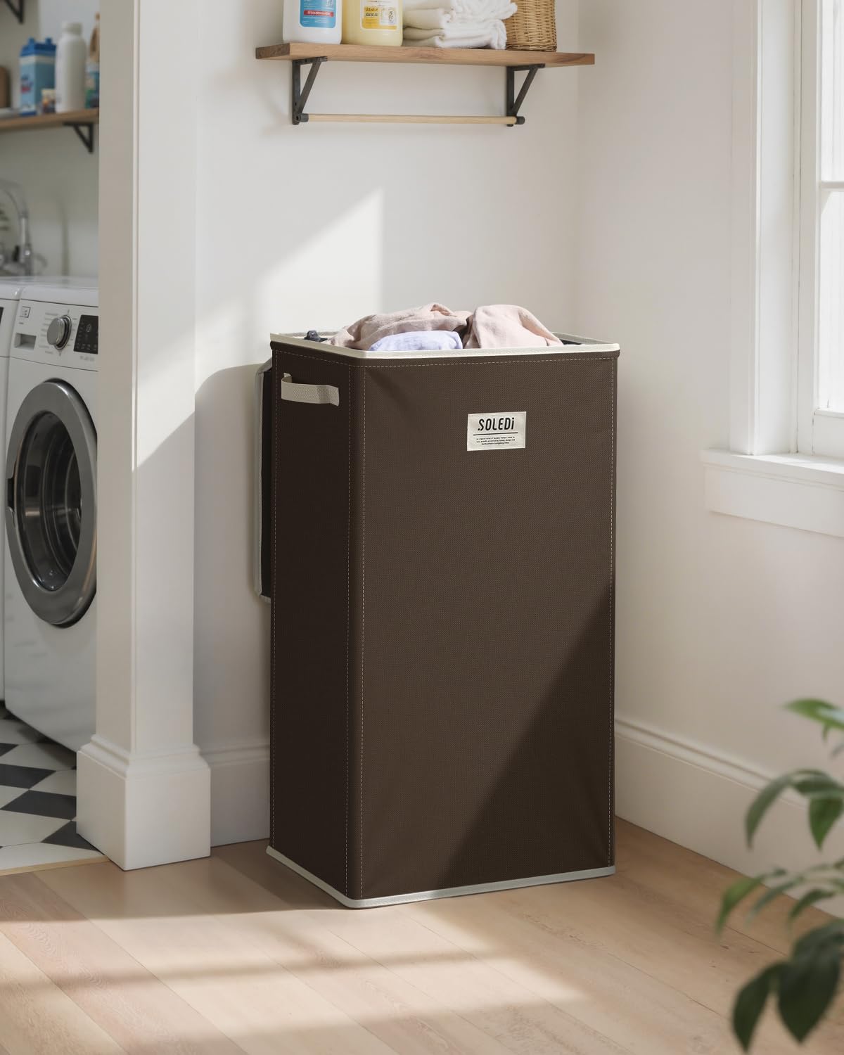 SOLEDI laundry hamper with lid close-up showing sturdy construction.