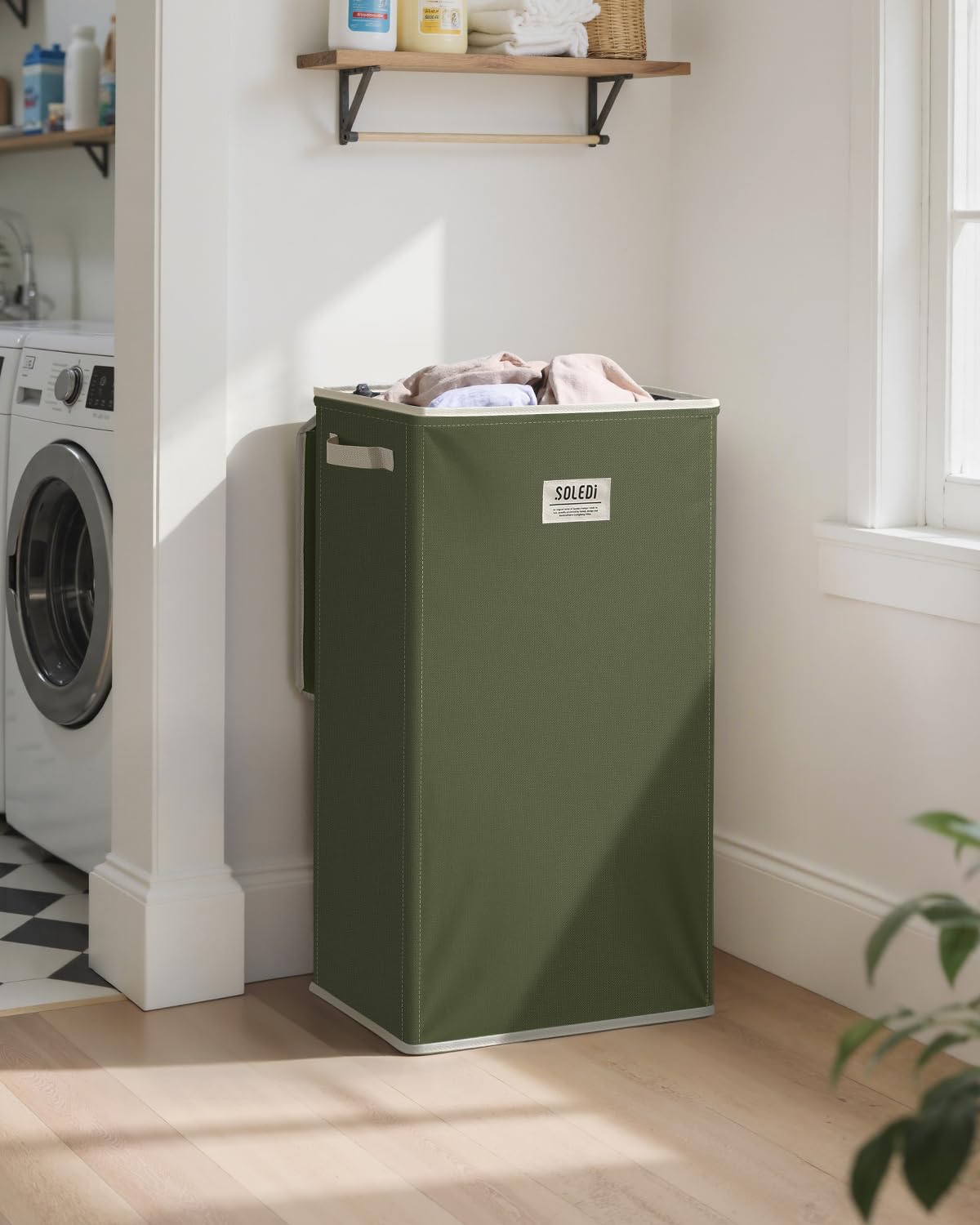 SOLEDI laundry hamper with lid keeps laundry out of sight