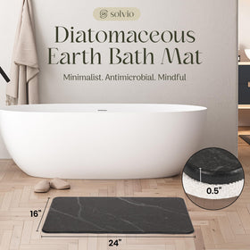 Solvio bath mat with non-slip pads provides stable footing when wet.