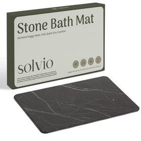 Solvio diatomite bath mat on floor, fast water absorption to keep floors dry.