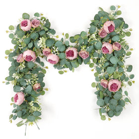 SOMYTING 2-pack 13ft flower garland laid out for arch setup, ready to decorate