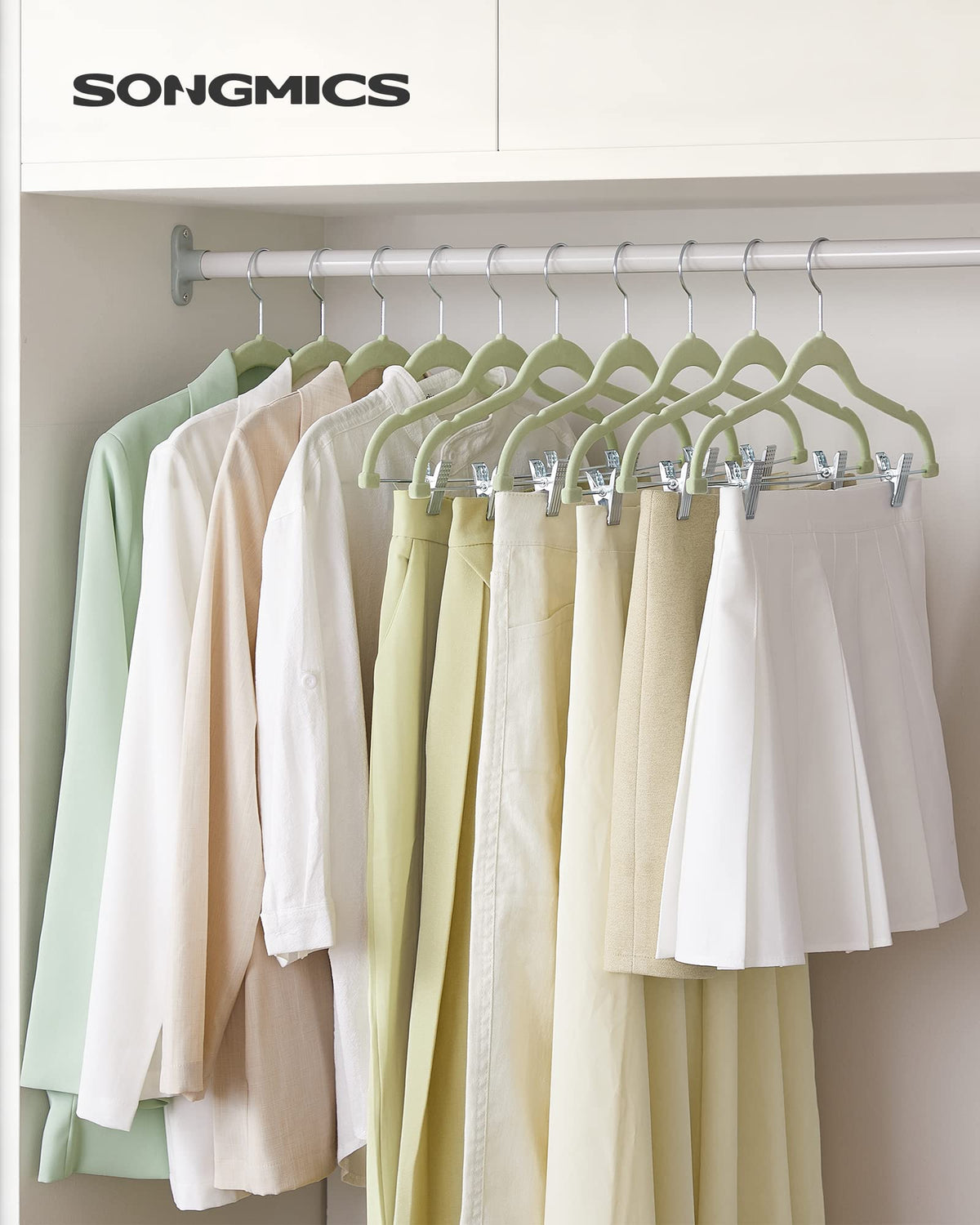 SONGMICS velvet hangers with adjustable clips for trousers and skirts of different widths.