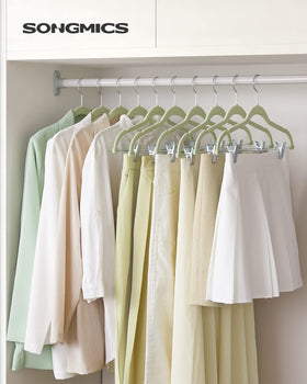SONGMICS velvet hangers with adjustable clips for trousers and skirts of different widths.