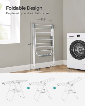 Two adjustable wings on SongMics rack extend drying height for long garments.