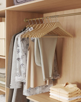 SONGMICS birch wood hanger closeup shows durable construction and natural finish.