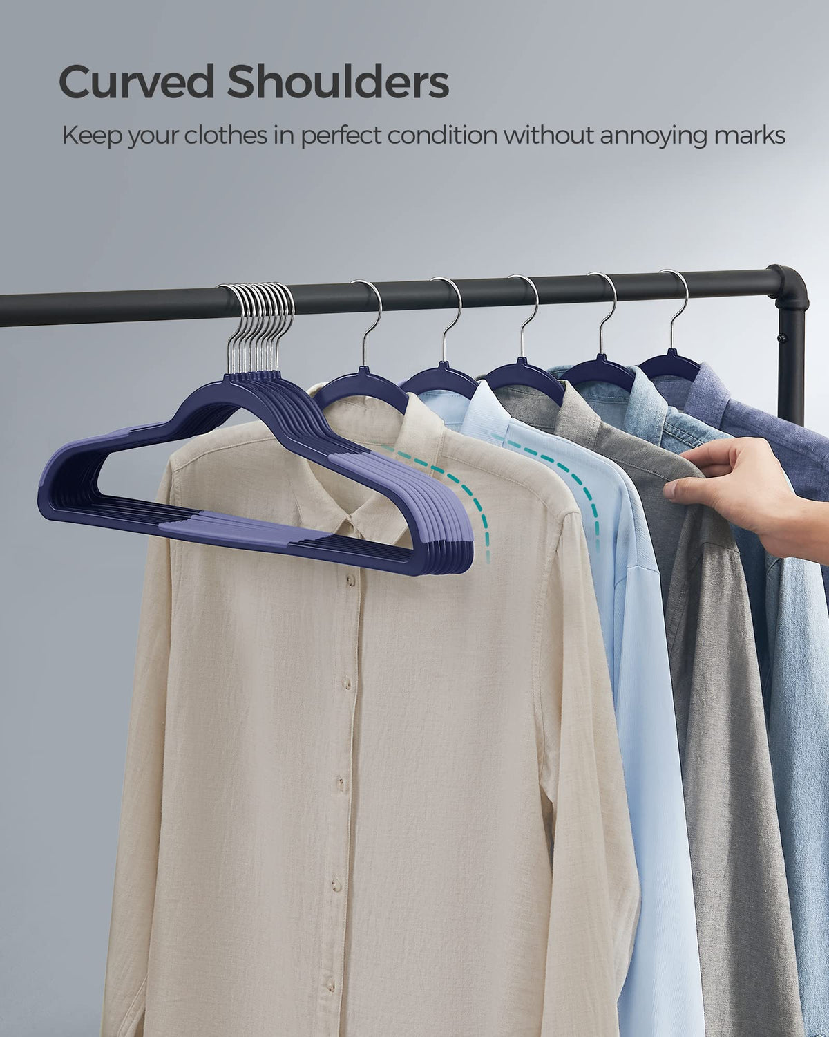 Songmics closet organization solution keeps shirts, dresses, and pants neatly arranged.