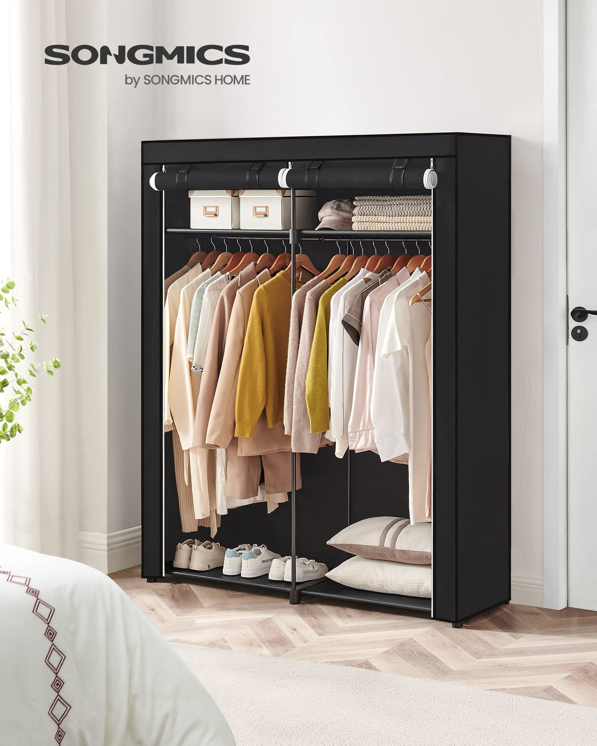 SONGMICS closet wardrobe with non-woven dust cover protects clothes from dust.