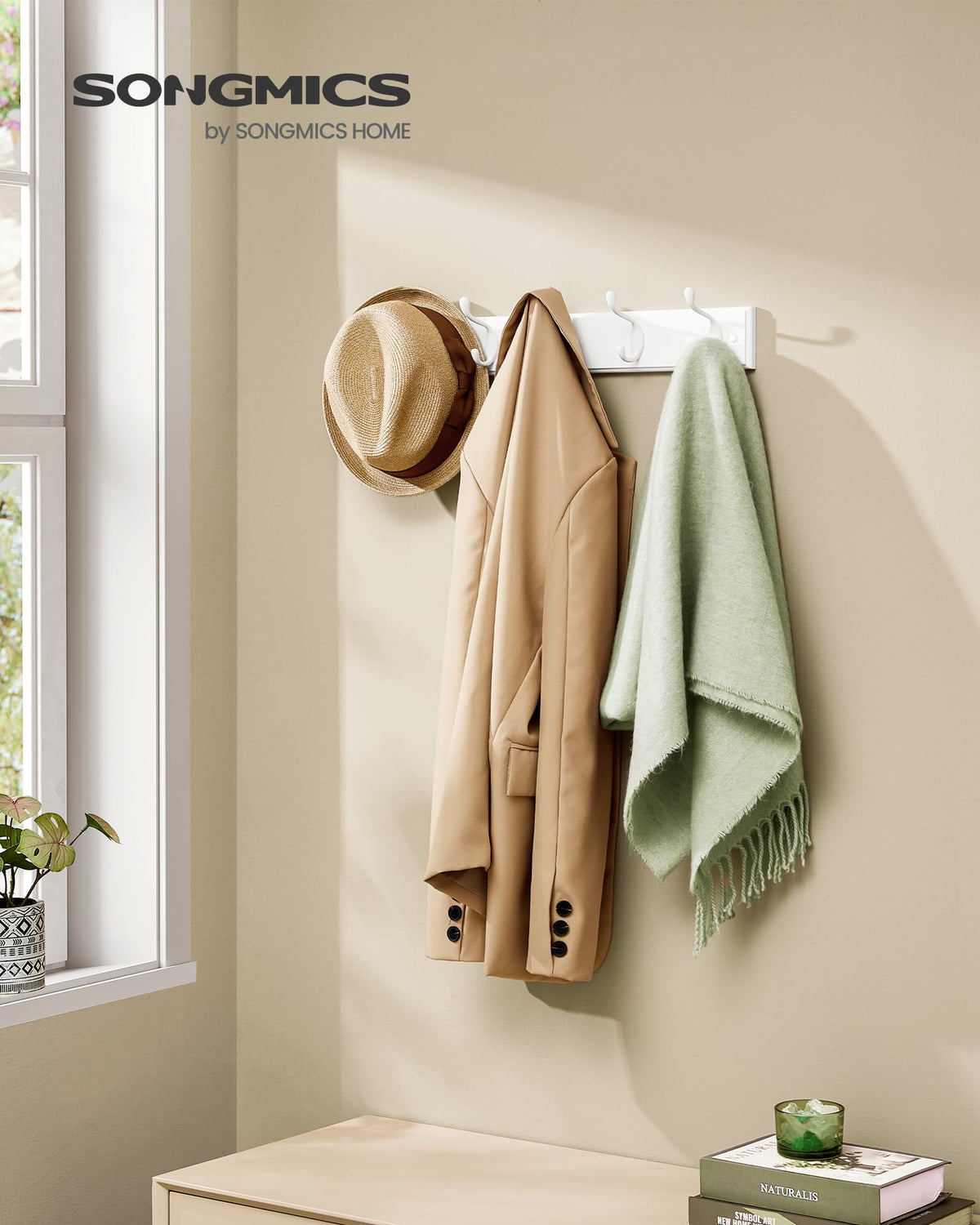 SONGMICS metal hooks closeup shows sturdy design for daily use.