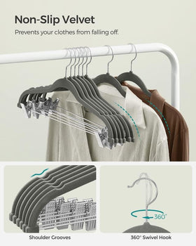 SONGMICS 30-pack velvet hangers neatly organized in a wardrobe