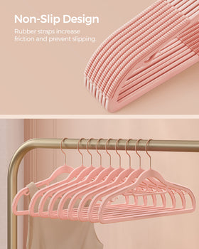 SongMICS hanger with curved ends to prevent shoulder marks