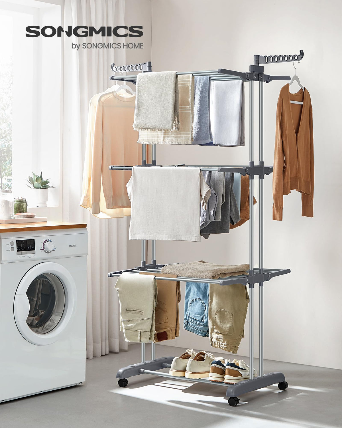 Songmics Dove Gray 4-tier drying rack side view emphasizes tall sturdy frame.
