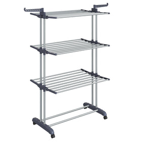 Songmics Dove Gray 4-tier rack in use with towels and garments.