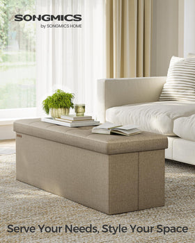 SONGMICS ottoman features linen-look fabric for stylish, comfortable storage seating.