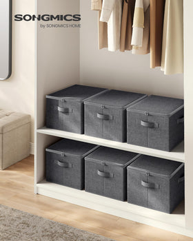 SONGMICS storage box with front handle allows easy pull-out from shelves for quick access.