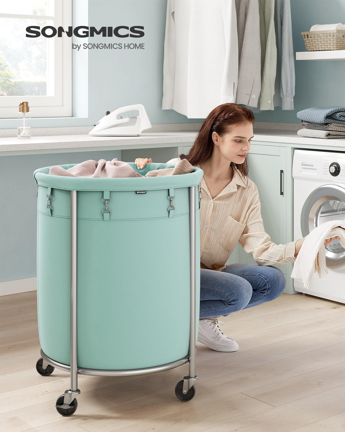 SONGMICS metallic silver steel-frame laundry cart shows sturdy construction