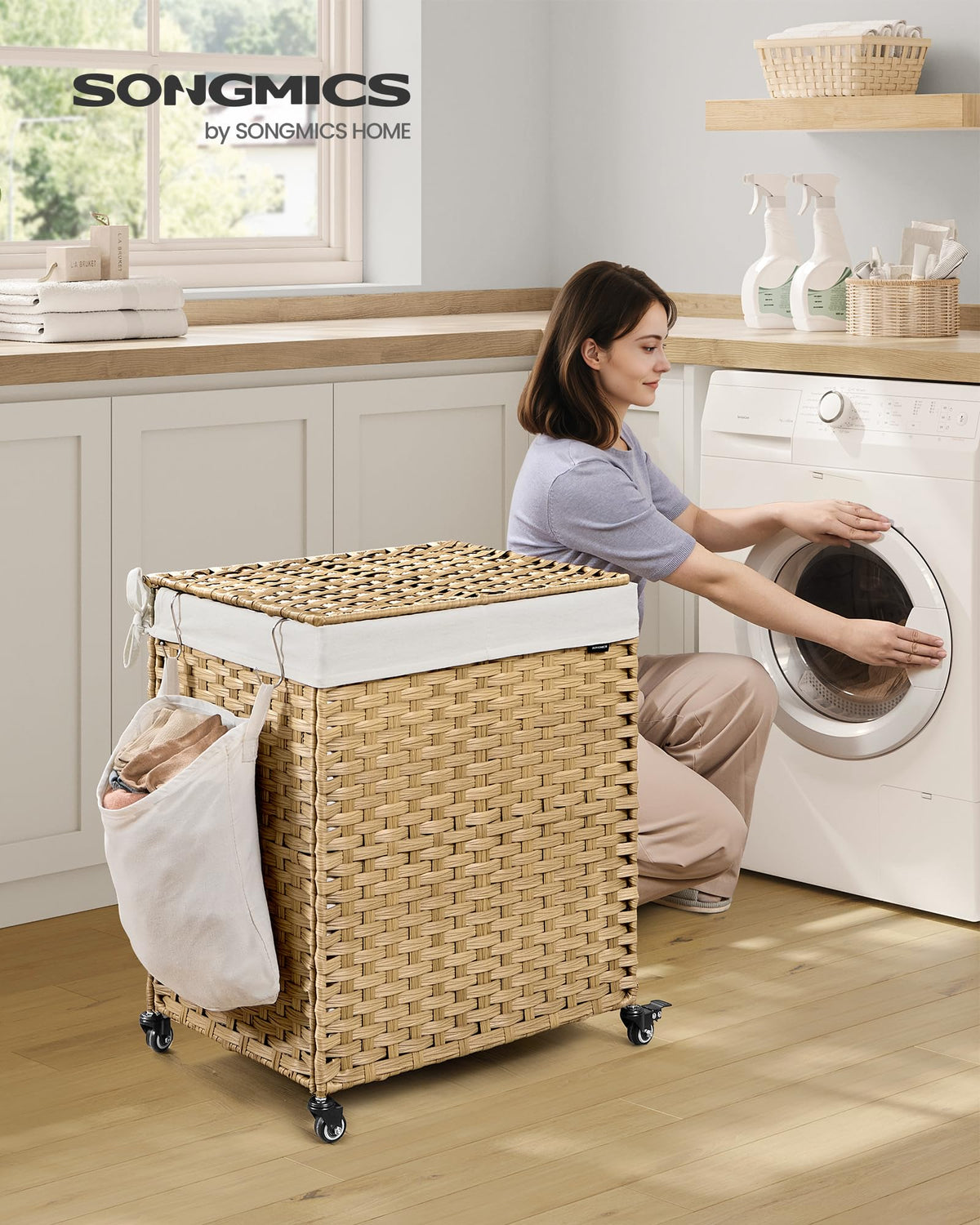 SONGMICS two-section hamper with removable liner ideal for pre-sorting laundry.