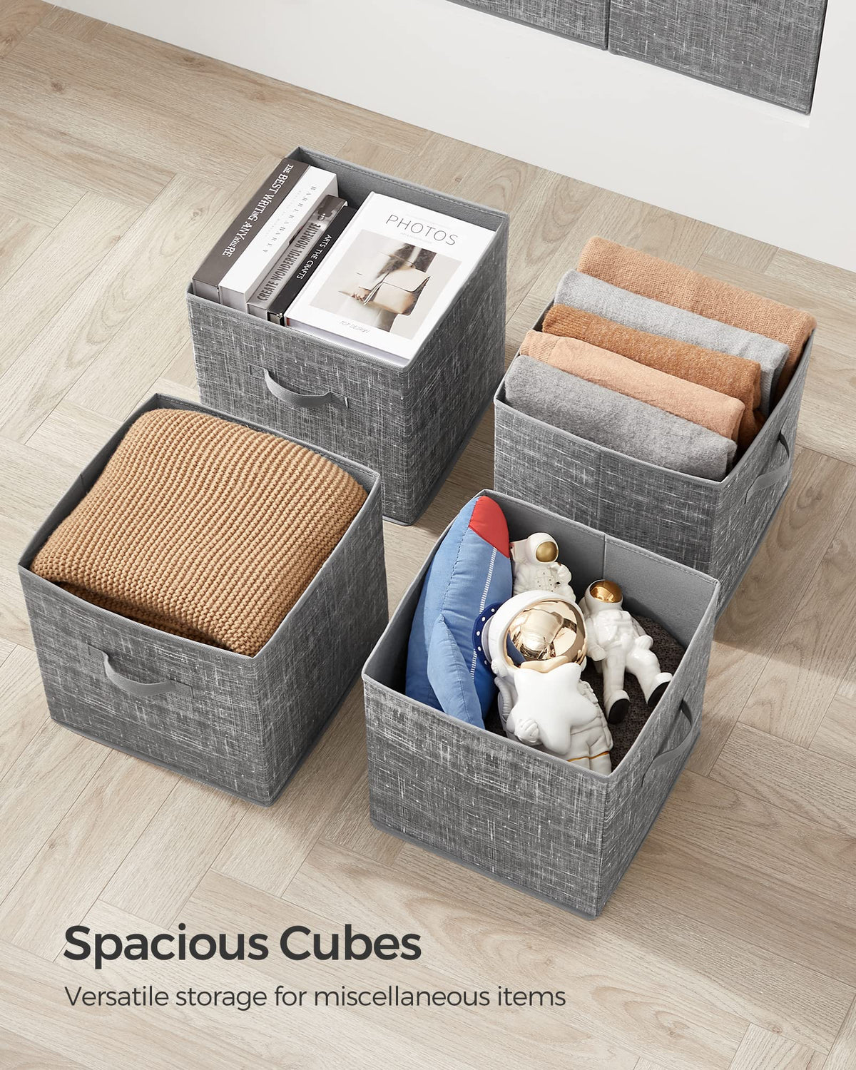 Living room sundries organized neatly using SONGMICS cubes.