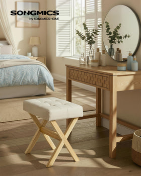 SONGMICS makeup stool with solid wood X-legs showing sturdy construction