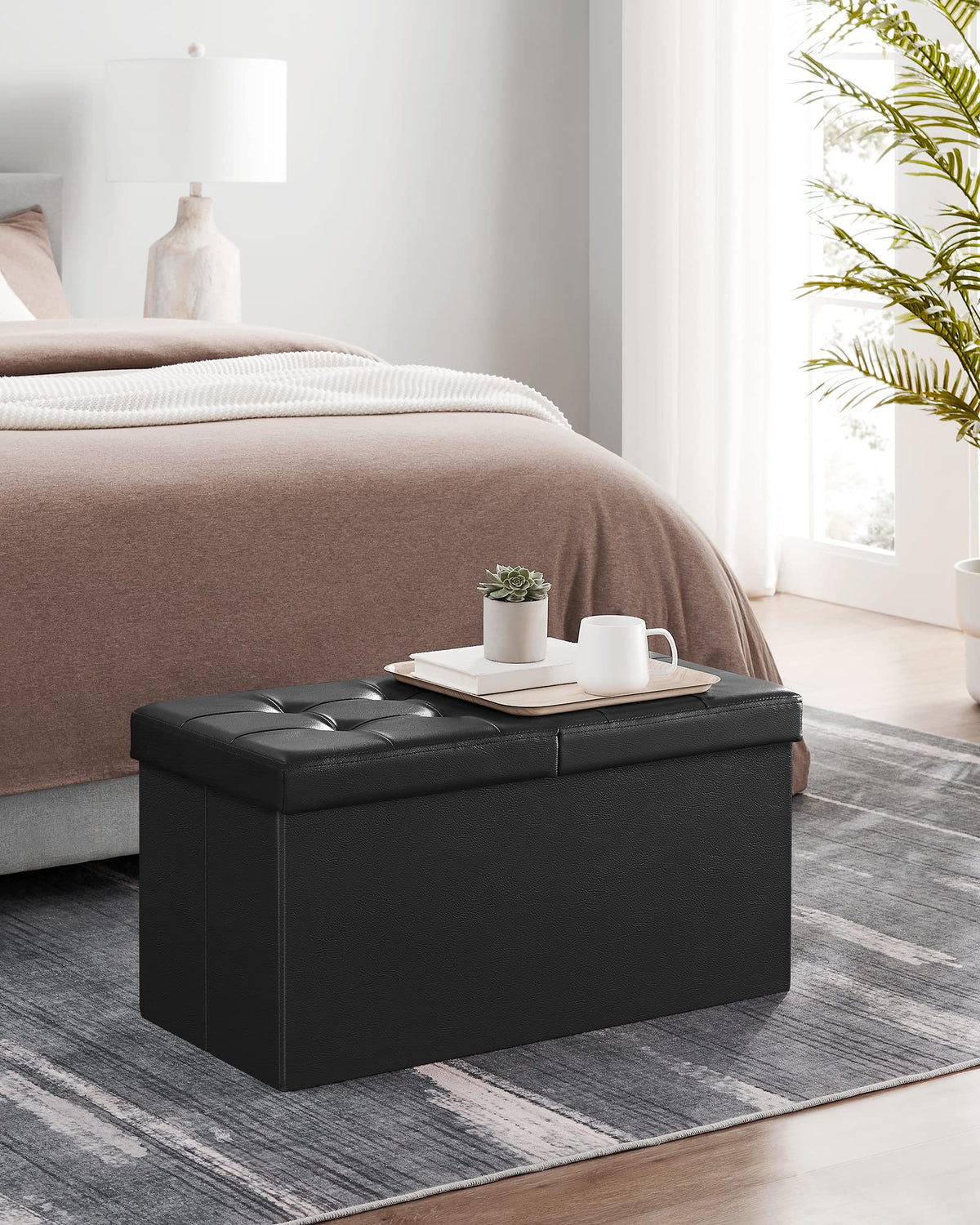 Songmics MAZIE 30-inch ottoman 24-gallon capacity for blankets and books.