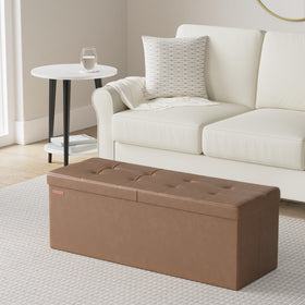 SONGMICS Mazie 35-gallon storage ottoman holds blankets, books, and linens.
