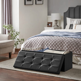 SONGMICS Mazie black storage ottoman fits modern living rooms