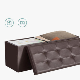 Removable divider inside MAZIE organizes stored items.