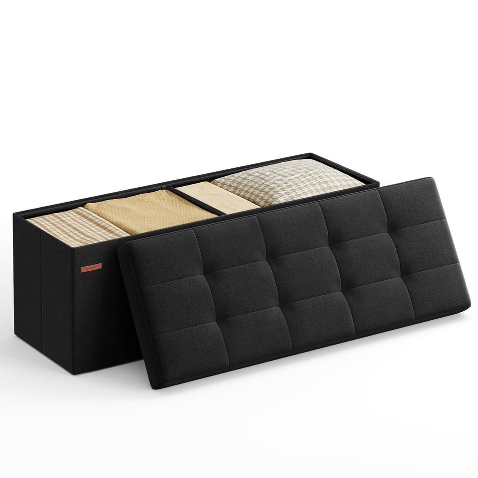 Songmics MAZIE folding storage ottoman bench in ink black, compact seating with hidden storage.