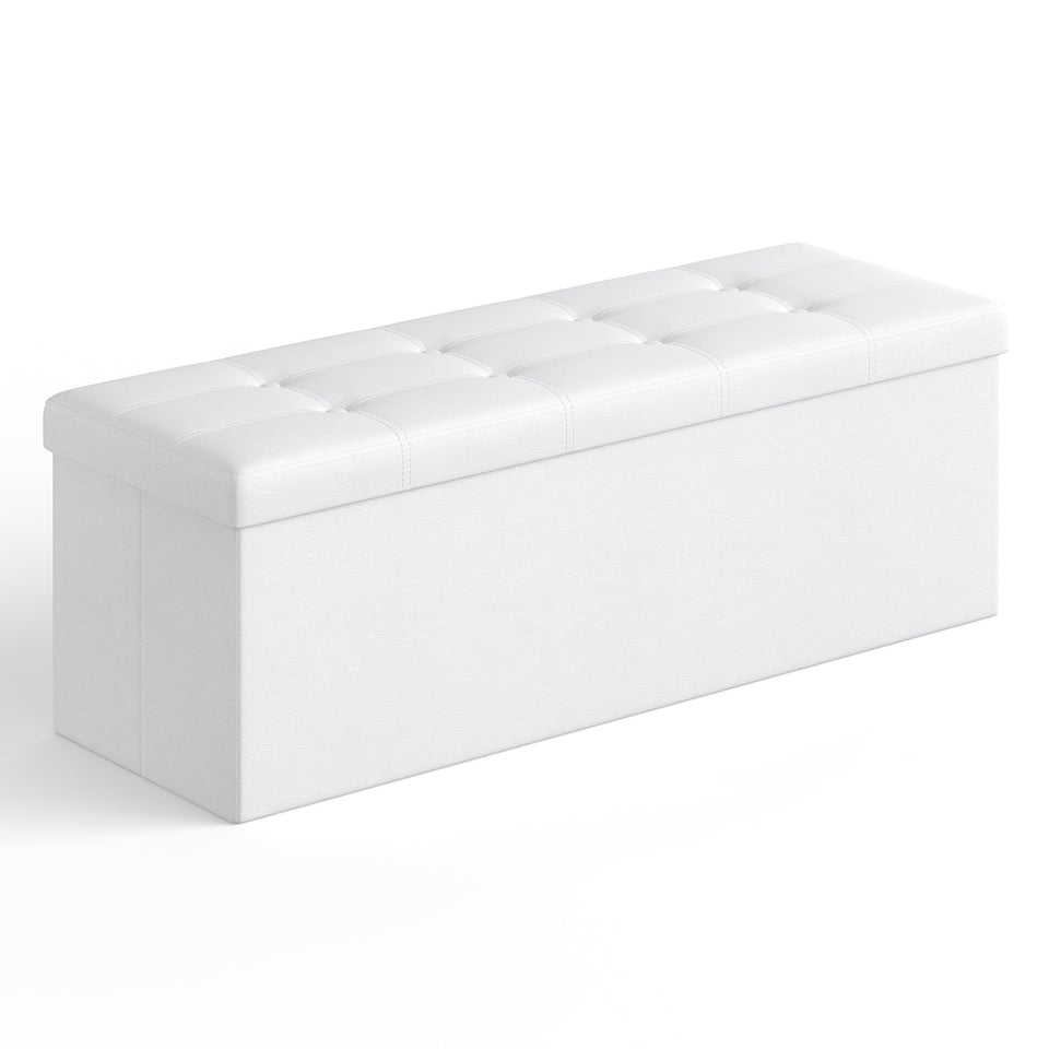 SONGMICS MAZIE folding storage ottoman in white provides quick seating for a living room.