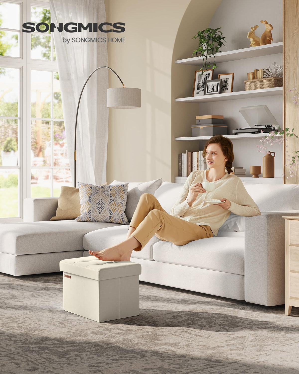 SONGMICS Mazie foot rest in cream white for comfortable seating and tufted style.