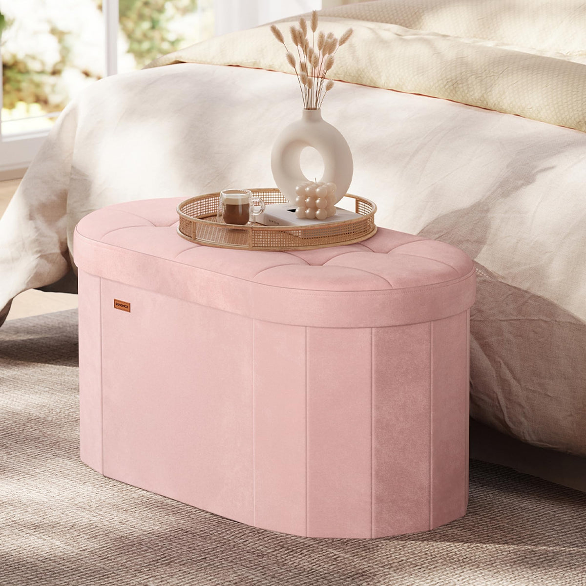Songmics Mazie oval storage bench in jelly pink ideal for blankets and decluttering