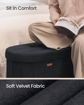 Front view of Songmics Mazie oval storage ottoman in ink black